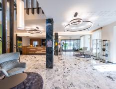 Empfangsbereich und Rezeption des Hotel-Restaurant Grimmingblick