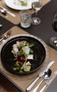 Ein gedeckter Tisch im DAS RONACHER Thermal und Spa Resort